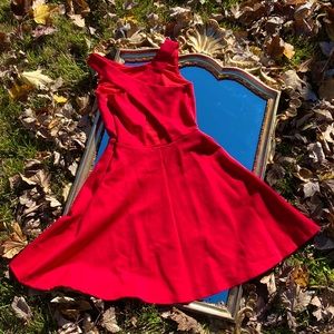 Francesca’s red crossback dress